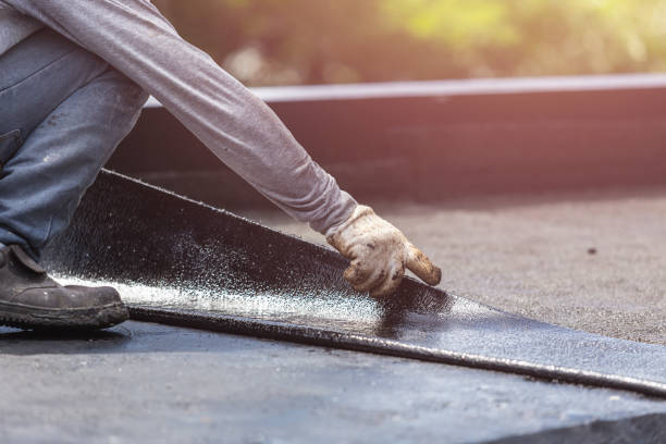 Professional Waterproofing technician working in Elkhart, KS